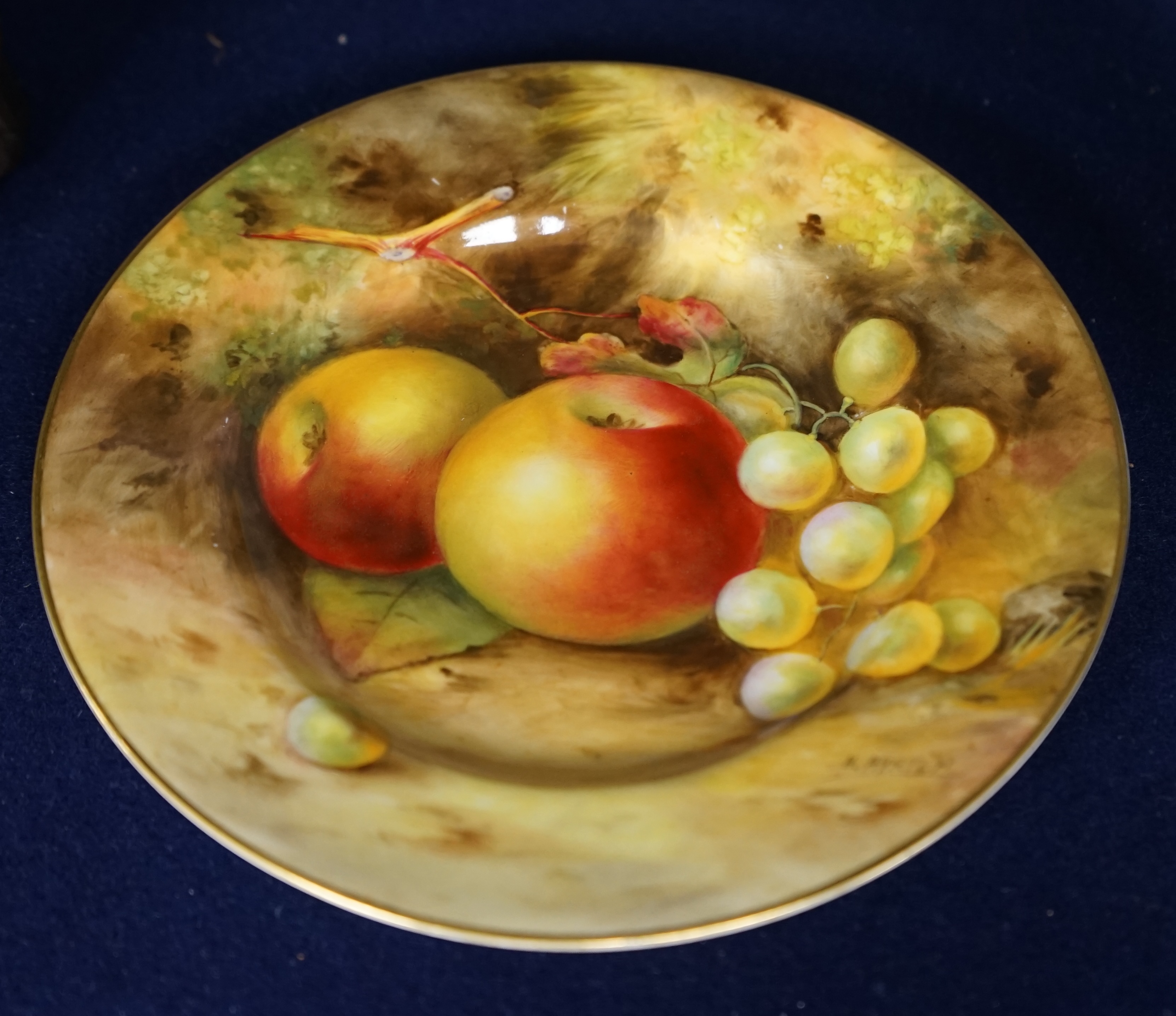 A Worcester cabinet plate, signed Ayrton, decorated with fruit, 15.5cm diameter. Condition - good